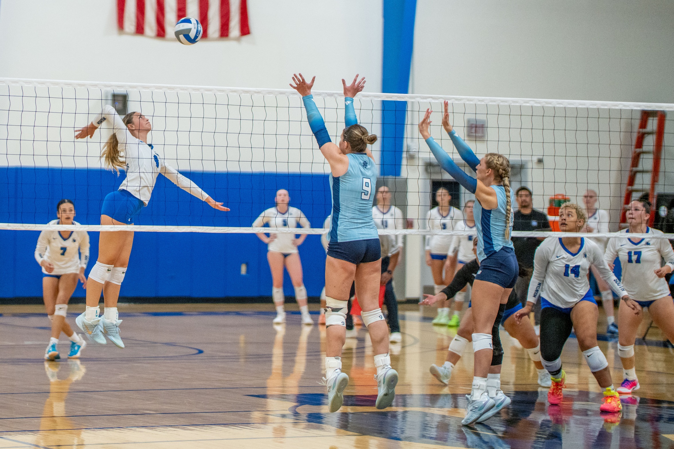 The Cougars attack a double block in a match with Pima CC on Sept. 5, 2025. 