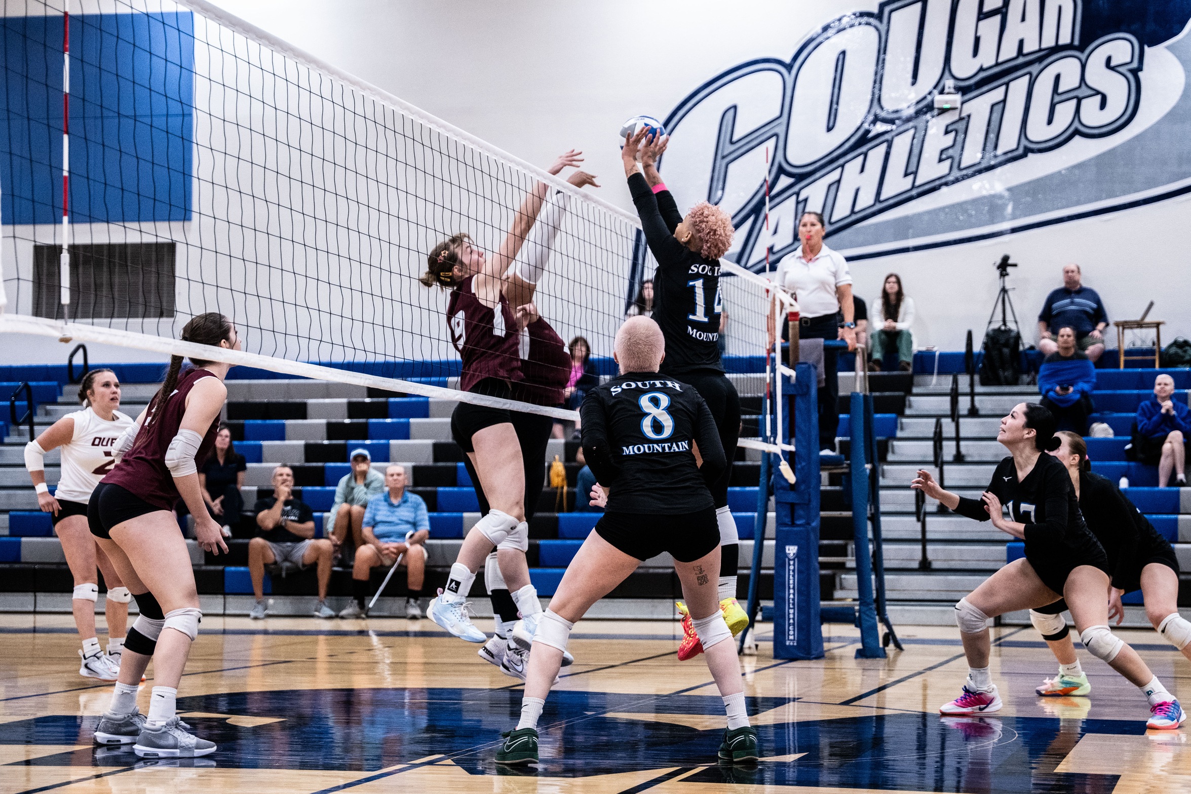 Sophomore Esra Bryant stuffs an attack in a win over Ottawa University (JV) on Oct. 15. 