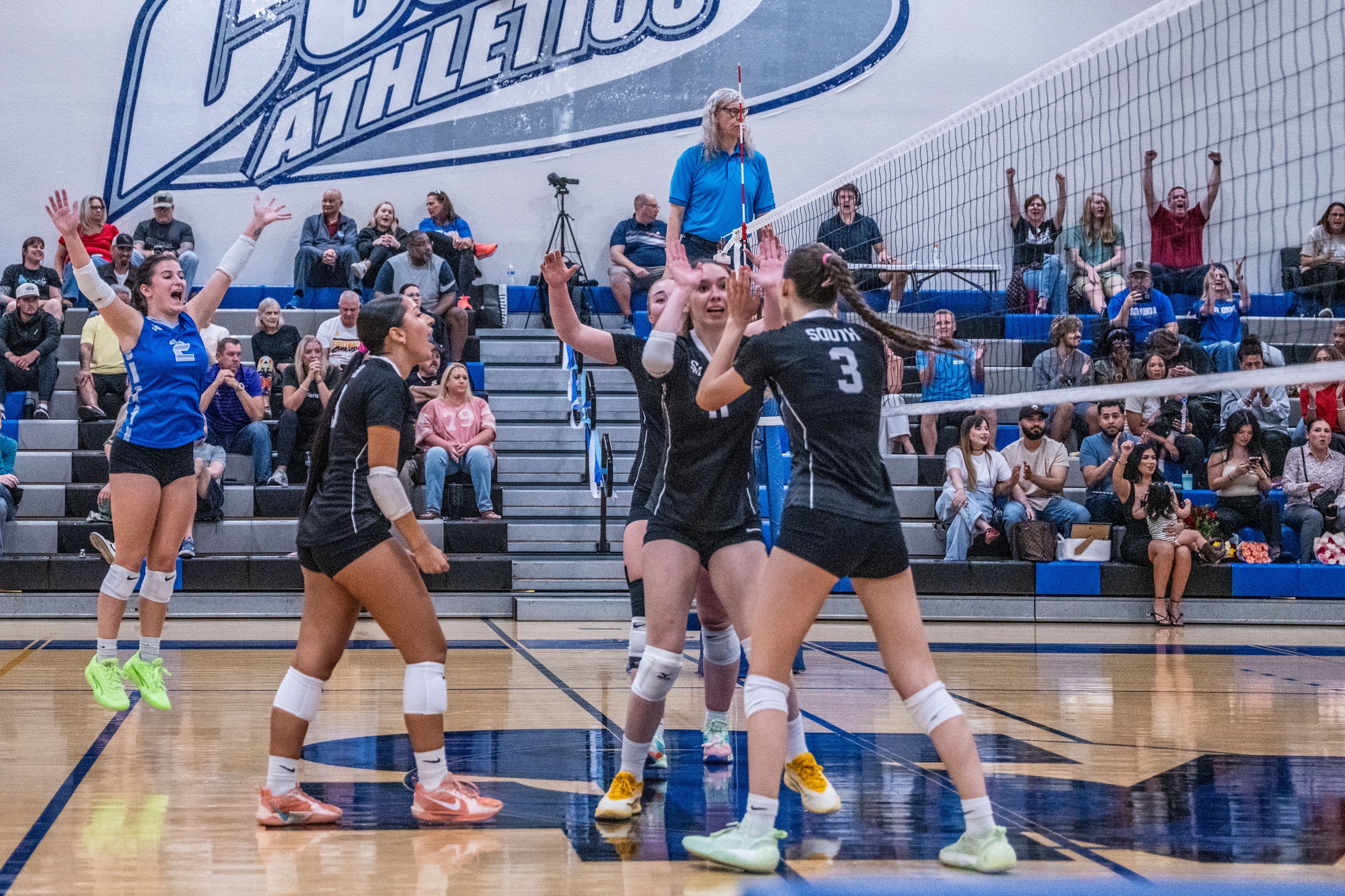 The Cougars celebrate a point in a match vs. Chandler-Gilbert CC on Oct. 24, 2025. 
